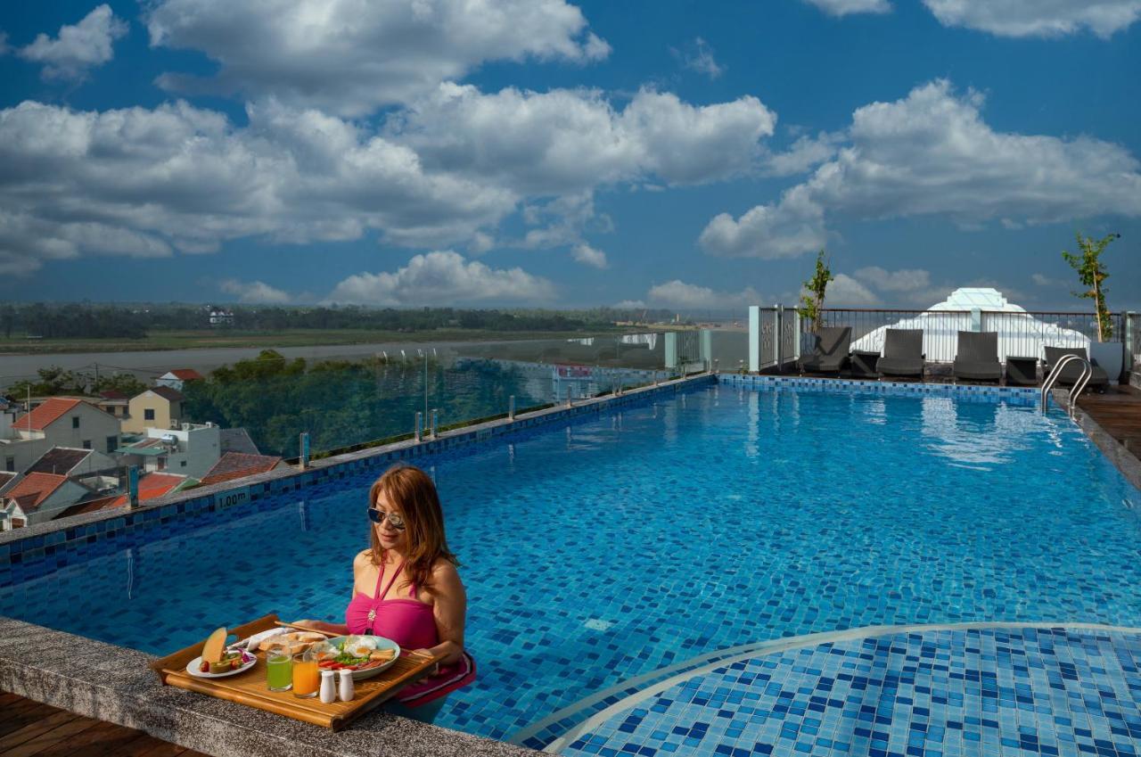 فندق بوتيك كوزي سافي هوي آن هوي ان المظهر الخارجي الصورة Rooftop pool at the hotel