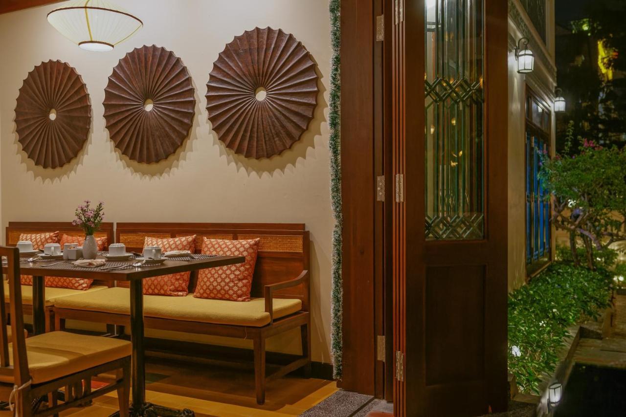 فندق بوتيك كوزي سافي هوي آن هوي ان المظهر الخارجي الصورة Interior of a restaurant in Ho Chi Minh City