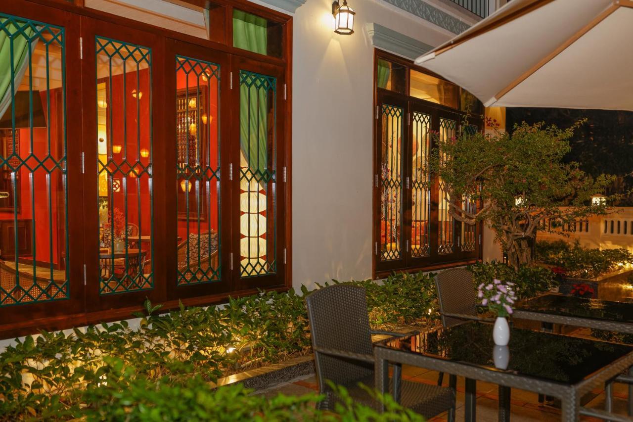 فندق بوتيك كوزي سافي هوي آن هوي ان المظهر الخارجي الصورة The interior of the restaurant